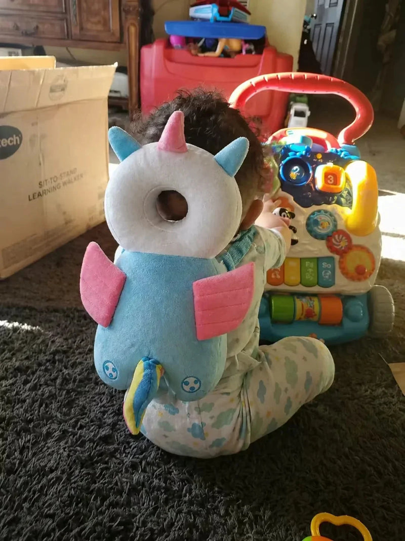 Baby wearing the Unicorn Snugjooy baby head protector, parent review